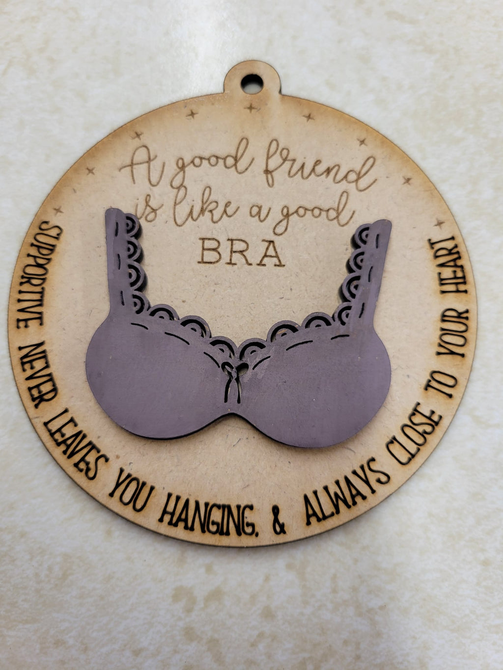 A good friend is like a good bra ornament