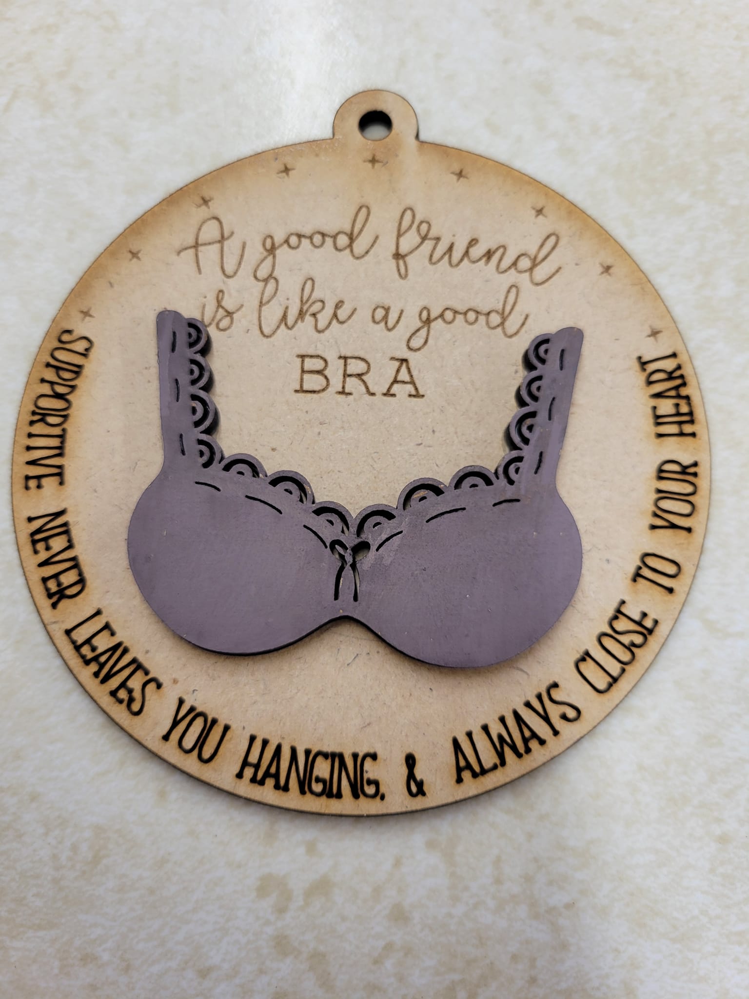 A good friend is like a good bra ornament